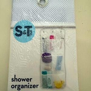 A shower organizer that hangs on the shower curtains hooks and holds a lot
